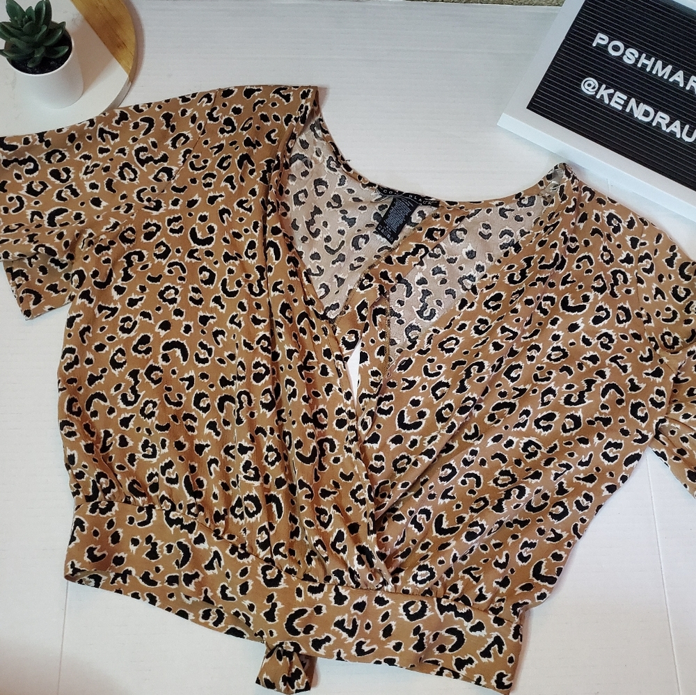 Leopard print tie back blouse